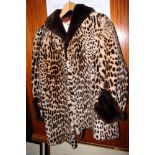 A treated lambskin animal print jacket