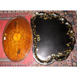 An Edwardian mahogany and inlaid Sheraton design gallery tray, 27" max dia, and a mid 19th century