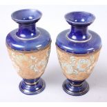 A pair of Doulton Slater's patent shouldered vases, on circular feet, 10 3/4" high