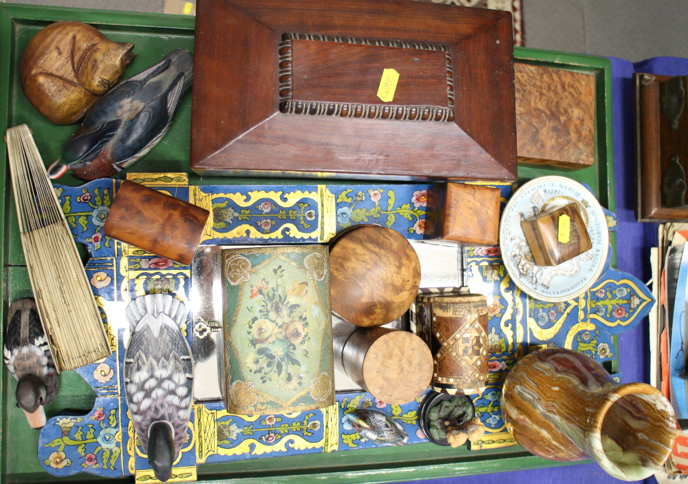 An early 20th century mahogany tea caddy, a quantity of boxes, a treen model of a cat and other