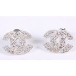 A pair of white metal ear studs, set cubic zirconia, stamped 925
