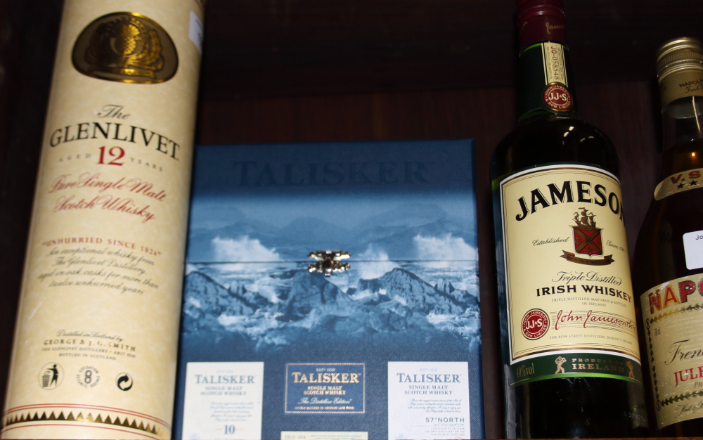 A bottle of Bells 12 year old Scotch whisky, a bottle of Jameson Irish whiskey, a bottle of - Image 2 of 2