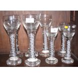A set of five opaque twist stem goblets, on weighted bases, and three smaller similar goblets (small