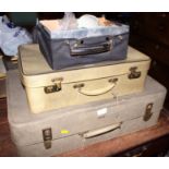 A dentist's travelling case with tools and accessories and two Antler "snakeskin" suitcases