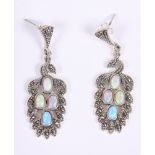 A pair of opal and marcasite white metal drop ear studs, formed as peacocks, stamped 925