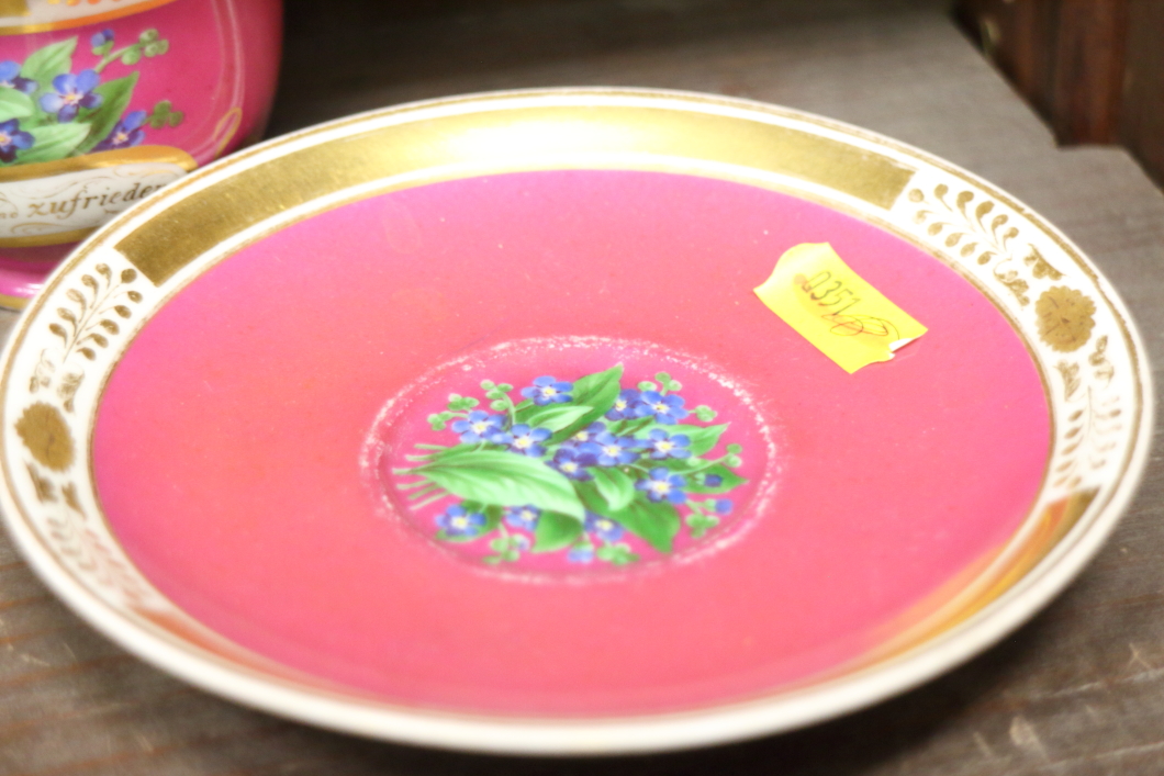 A German porcelain cabinet cup and saucer with a dark pink ground and gilt borders and another - Image 12 of 15