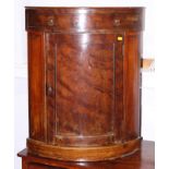 A 19th century mahogany floor standing corner unit, fitted single cupboard, on block base, 24" wide