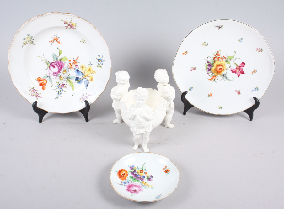 A 19th century Meissen plate decorated flowers, 9 1/2" dia, a smaller Meissen dish, another plate