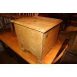 A Victorian stripped pine box seat commode with hinge lid, on bun feet, 17" wide, and a mahogany and