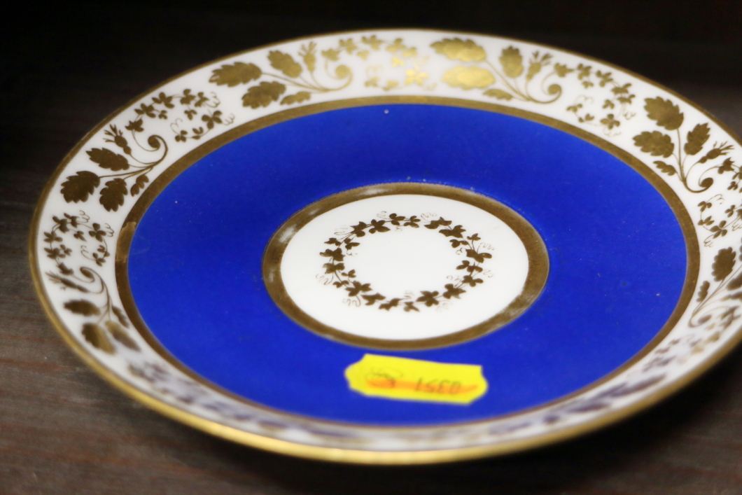 A German porcelain cabinet cup and saucer with a dark pink ground and gilt borders and another - Image 13 of 15