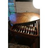 A mahogany and brass mounted canteen table of Louis XVI design, together with a part table service