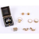A 9ct gold ring mounted citrine, size K/L, a pair of 9ct gold citrine set ear studs, a pair of 9ct