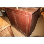 A mahogany side cupboard enclosed two doors, on block base, 44" wide