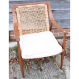 A Peter Hvidt & Orla Molgaard for France & Son, teak framed FD146 armchair, with a caned back and