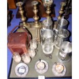 Five pewter trophies, two pairs of brass candlesticks, a trinket box, a carriage clock case, etc