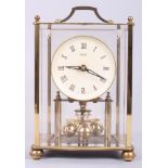 A brass and glass cased Kundo 400-day clock, 7 1/14" high