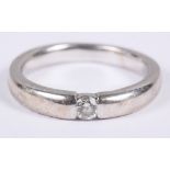 An 18ct white gold Millennium solitaire brilliant cut diamond ring, size R/S