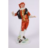 A 19th century Meissen porcelain figure of a Commedia dell'Arte character, 5 1/2" high (right