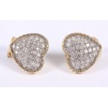 A pair of pave diamond heart-shaped studded ear clips, in yellow metal mounts, stamped 18ct