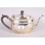 A silver oval teapot with composition handle, 16oz troy gross