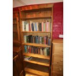 A pine bookcase, fitted five shelves, on block base, 33 1/2" wide