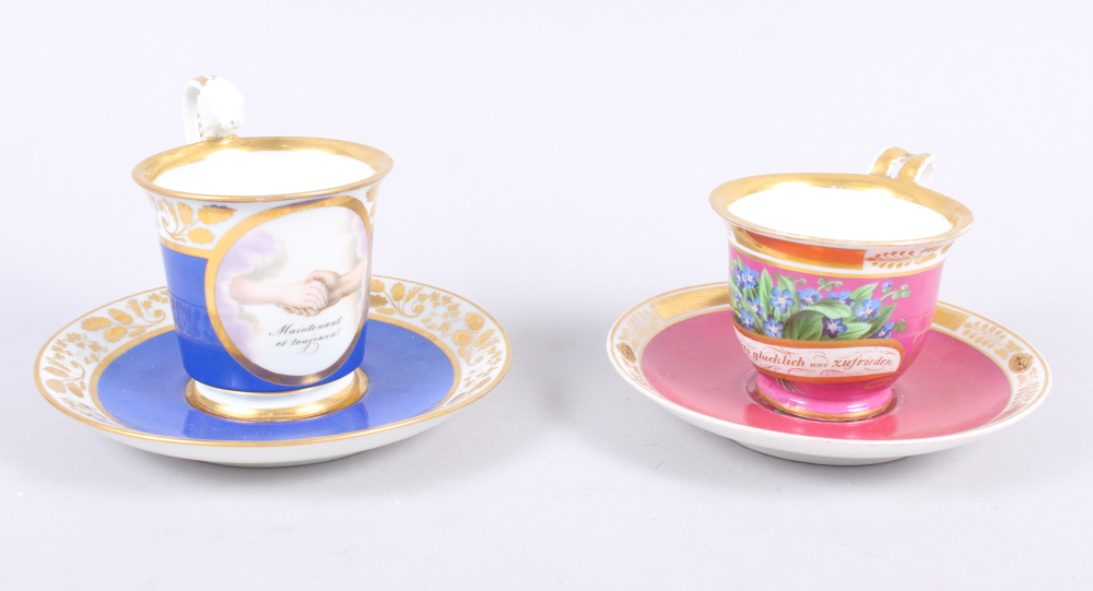 A German porcelain cabinet cup and saucer with a dark pink ground and gilt borders and another