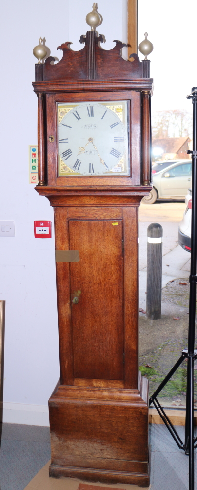 A 19th century oak long case clock with thirty-hour movement by Noakes, Battle, 82" high