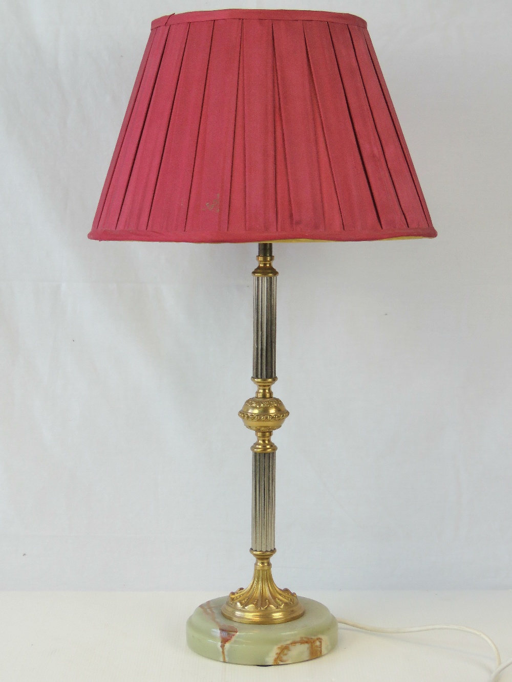 A smart onyx and gilt brass table lamp w