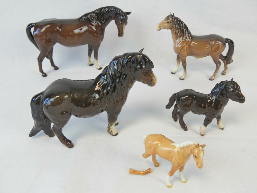 A Beswick Woolly Shetland mare and foal,