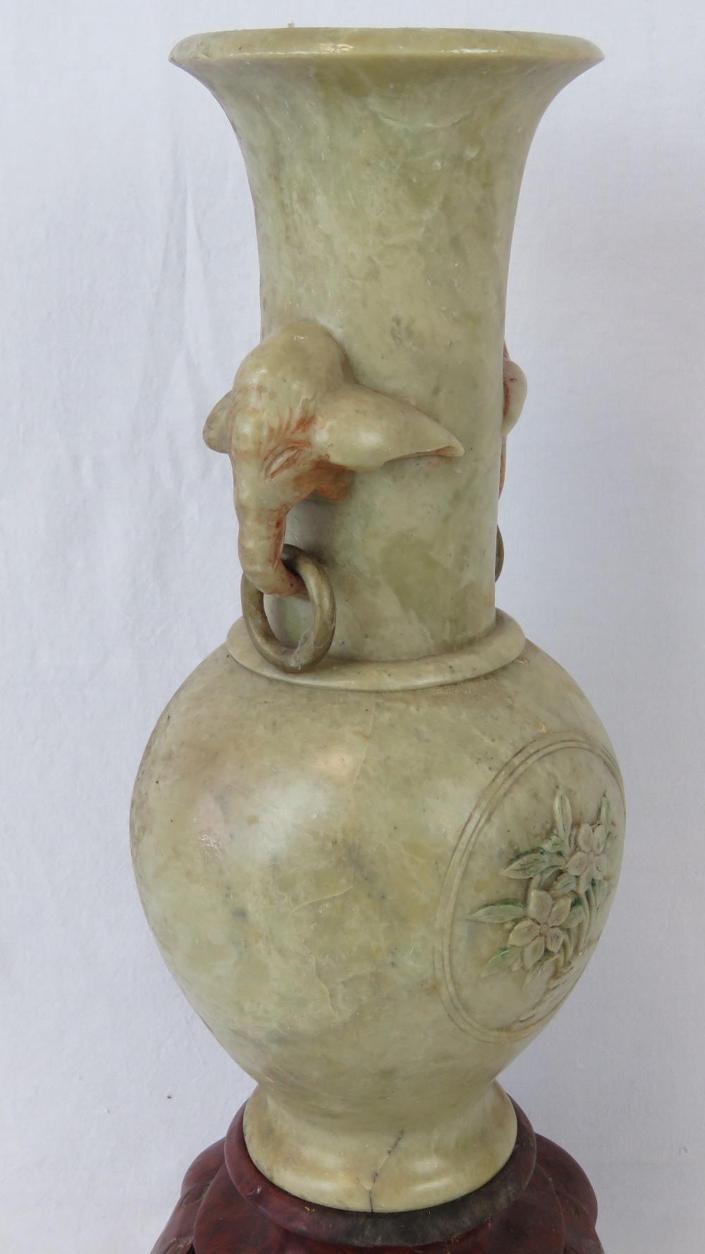 A heavy soapstone baluster vase with ele