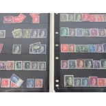 Four loose leaf pages of German stamps including nineteen rare Ukraine German stamps.