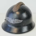 A WWII German Luftschutz Officers helmet with raised ridge.