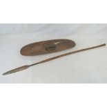 A tribal spear and shield, probably Australian Aboriginal hard wood,