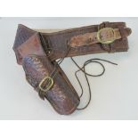 A US holster for the Colt Peacemaker Revolver, on belt with twelve inert .