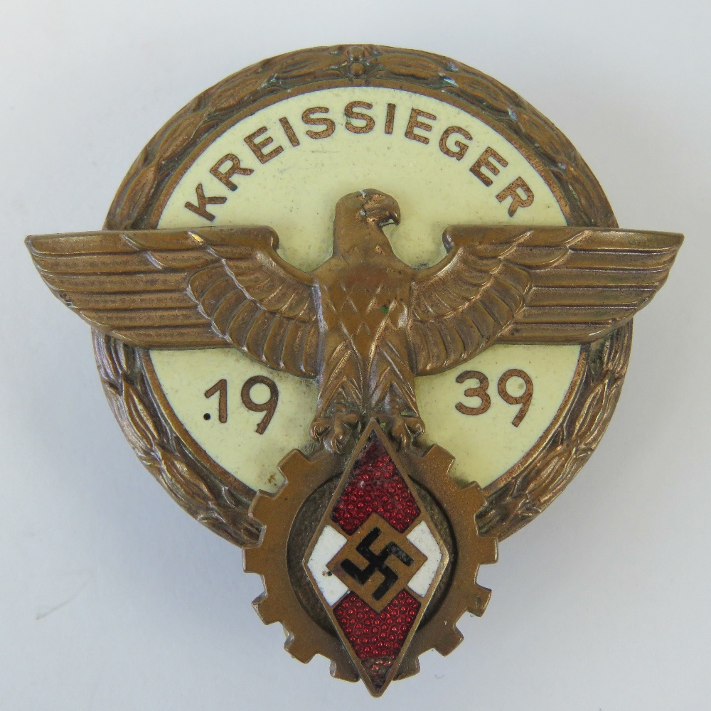 An enamelled WWII German Hitler Youth Leaders award badge, having makers marks upon.