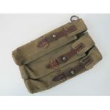 A WWII German MP40 magazine pouch in Afrika Korp / Tropical canvas, dated 1941,