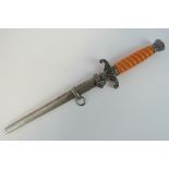 A WWII German Wehrmacht Army officers ceremonial dagger complete with scabbard.