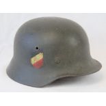 A good reproduction WWII German army helmet having double decal,