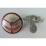 An enamel WWII German NSKK Party badge and a cap badge. Two items.