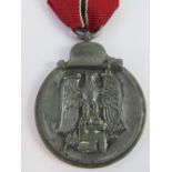 A WWII German Eastern Front 1941/1942 medal with ribbon.