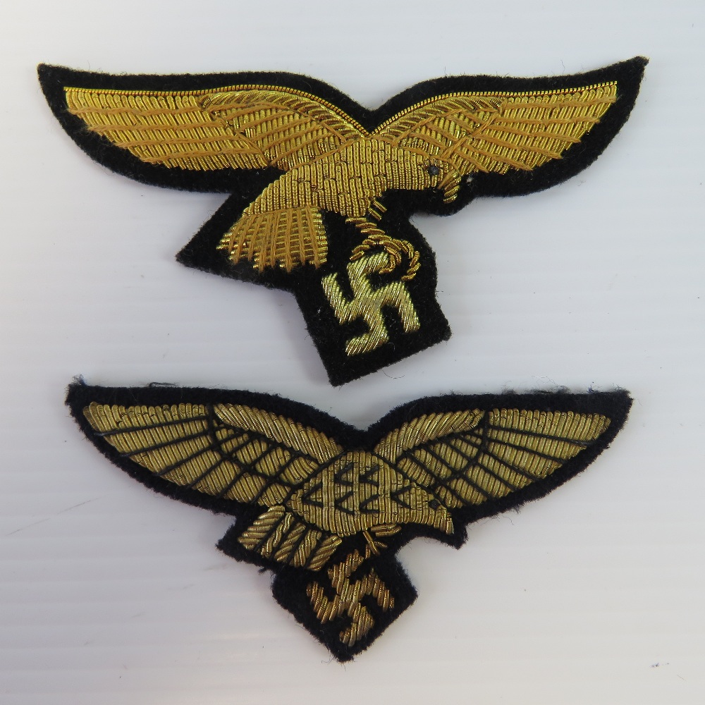 A pair of WWII German Luftwaffe gold brocade cap/uniform Eagles.