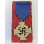 A WWII German 25 Year Faithful Service medal in original presentation box.