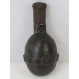 A WWI German 'Egg' grenade, having OJB makers mark upon, with original fuse and protective cap.