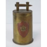 A trench Art shell case lidded pot having Royal Army Services Corps and Canadian Military badges