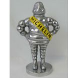 A large, contemporary Mr Bibendum figurine complete with Michelin sash standing 37cm high.