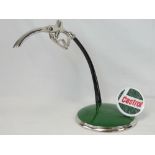 A contemporary desk piece in the form of a Castrol petrol dispenser. Cast metal and chromed handle.