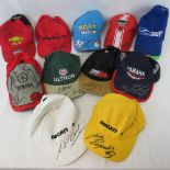 A collection of motor sport caps including Ducati, Yamaha, Suzuki and others,