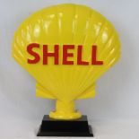 A large contemporary free standing Shell petroleum shield in case metal raises on a square shaped