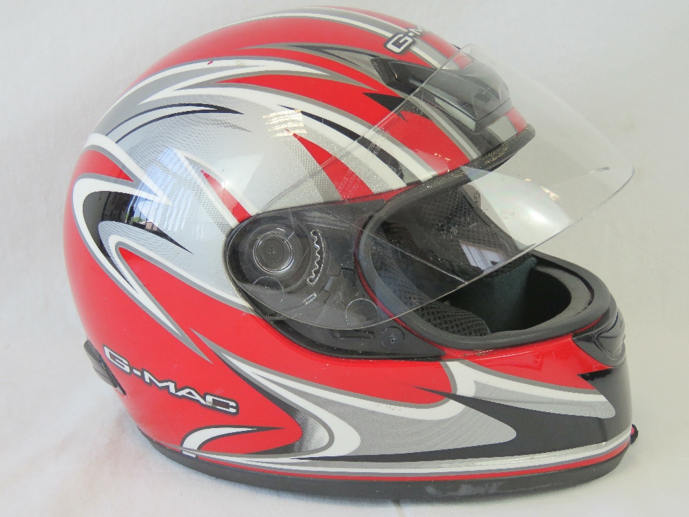 A FF311 motorcycle helmet, size small, c