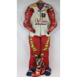 A set of signed motorcycle racing leathers for Chris Walker,